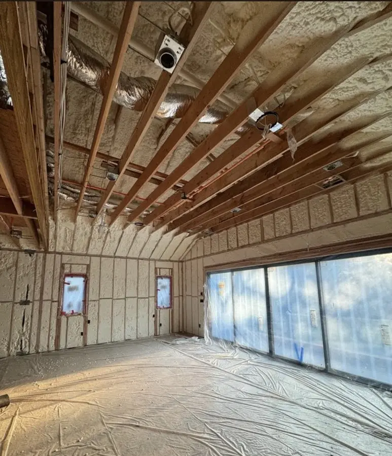 Interior walls and ceiling insulated with spray foam during new construction in Bel Aire